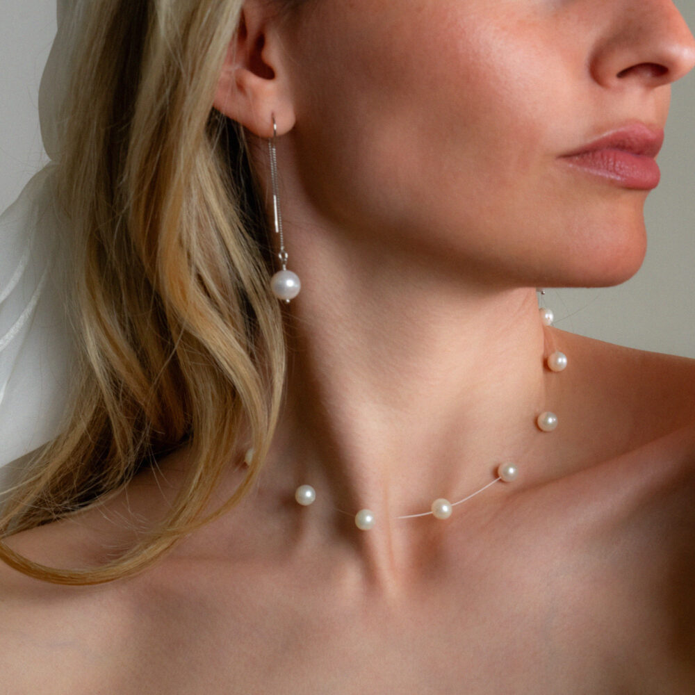 White Pearl Necklace on Illusion Cord | 6.5 – 7.5 mm | Round Pearls | 17 pcs. - Image 1